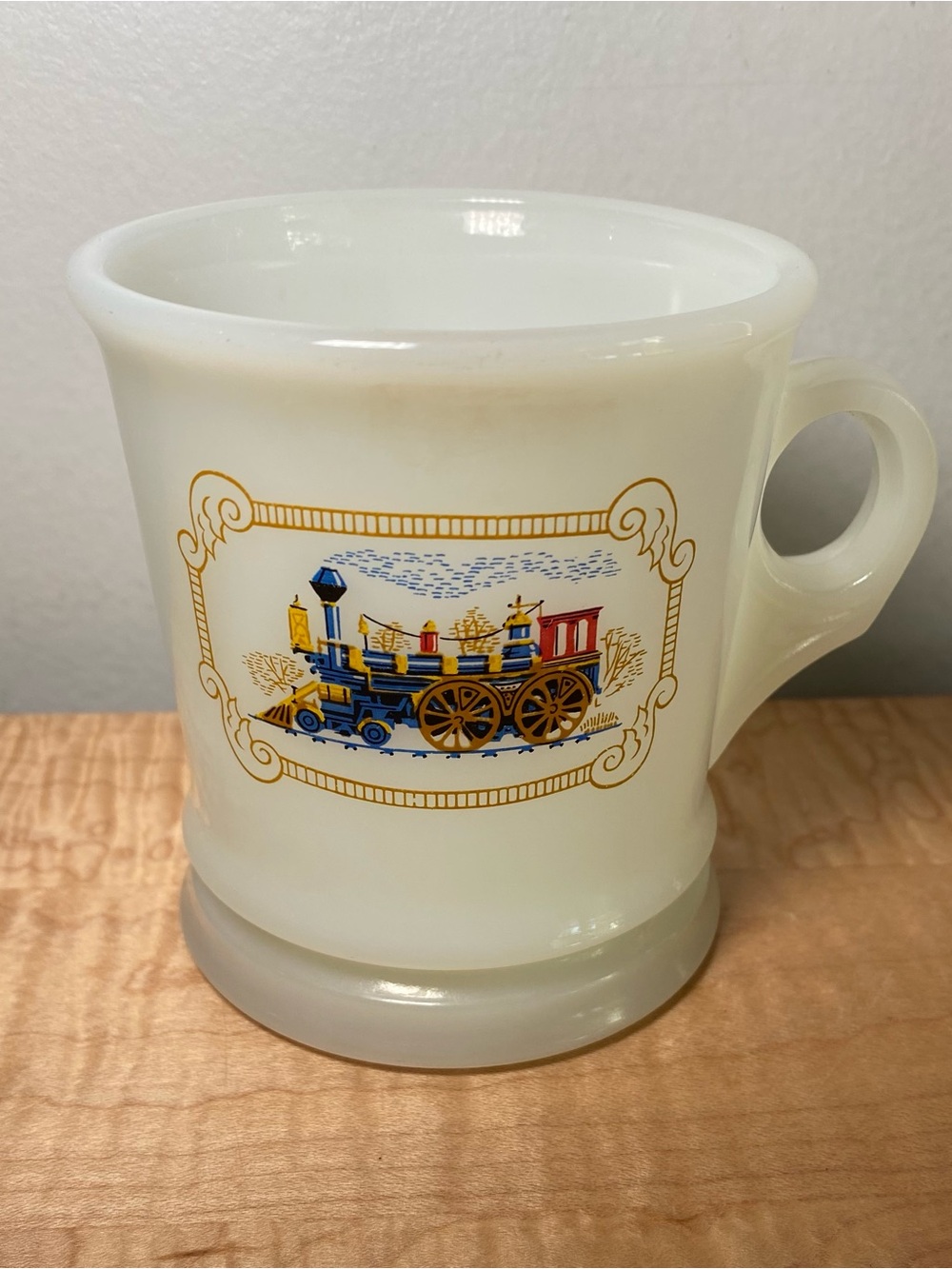 Avon White Milk Glass Mug with Blue and Gold Train Motif